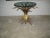 Vintage Hollywood Regency Sheaf of Wheat gilded table with tall pieces of gilded shaped wheat. The wheat is wrapped...