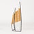 Beautiful sculpture by Fred Leyman, made with wood arranged on a black lacquered metal frame that is arched in the base....