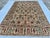 This breathtaking hand-knotted wool area rug features an elegant Sultanabad design with a Chobi finish. The central field...