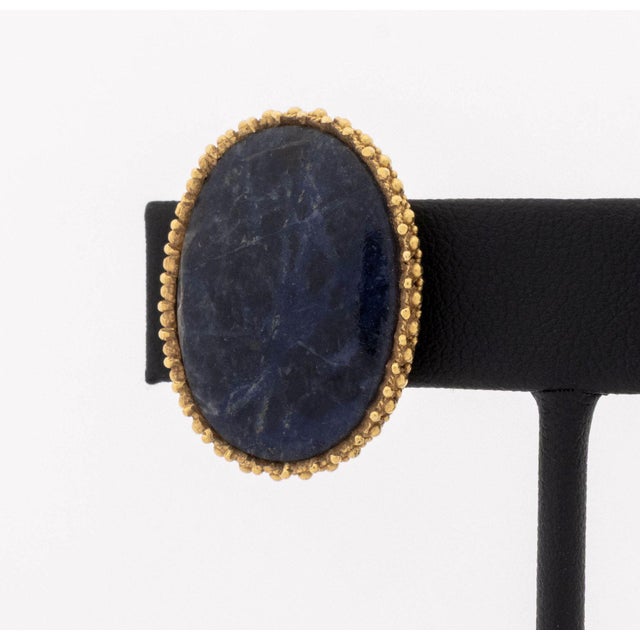 Pair of Lalaounis 18K Yellow Gold and Lapis Lazuli Earrings, featuring two bezel set oval lapis cabochons weighing a total...