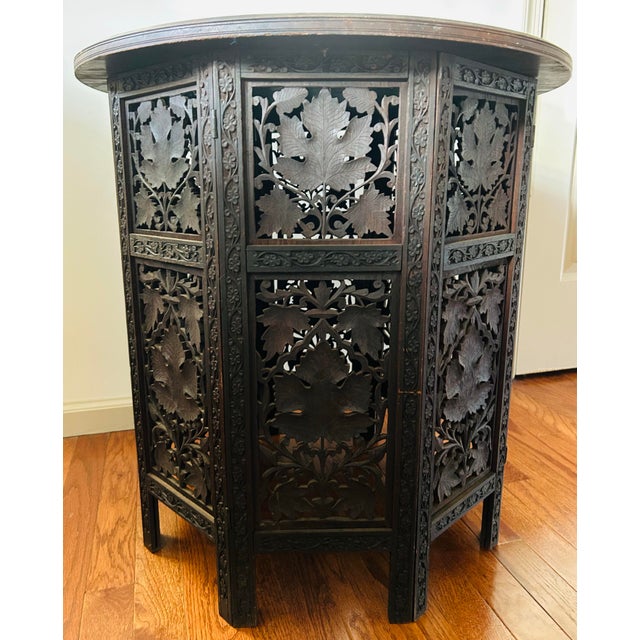 Beautiful, large, antique Moroccan carved dark mahogany wood, octagonal side table. Very ornate design, lots of great...