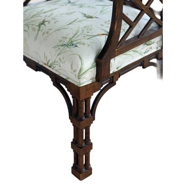CHINESE CHIPPENDALE STYLE CARVED MAHOGANY ARMCHAIR, MODERN, pagoda style back with hand carved fretwork, sloped arms with...