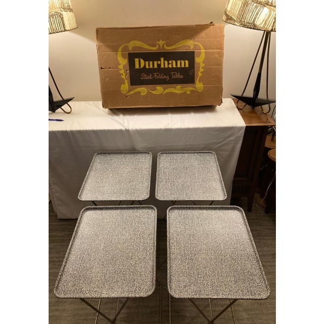 Set of 4 folding trays with caddie/holder in original box (6 pieces total including the box). Condition: This is a used...