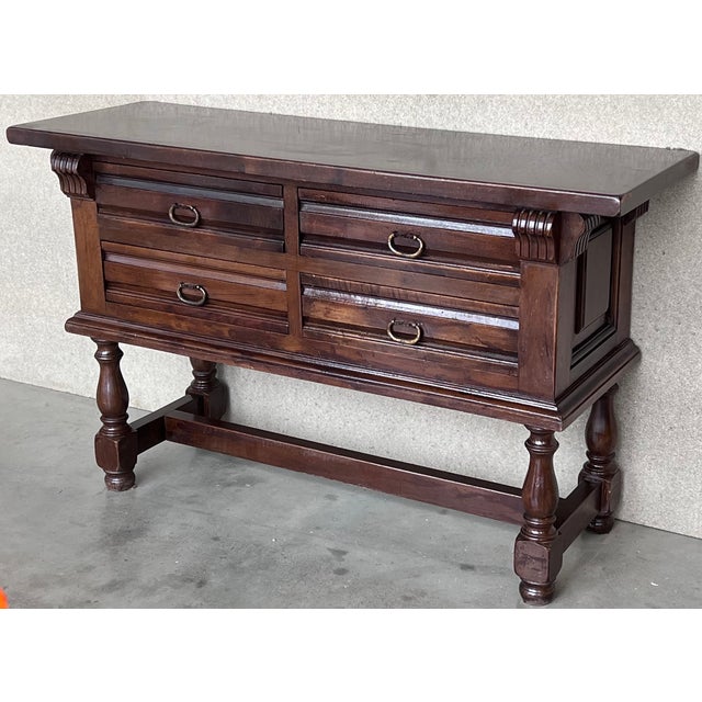 This large Spanish early 20th century features a beautiful one plank rectangular top over four wide carved drawers. Each...