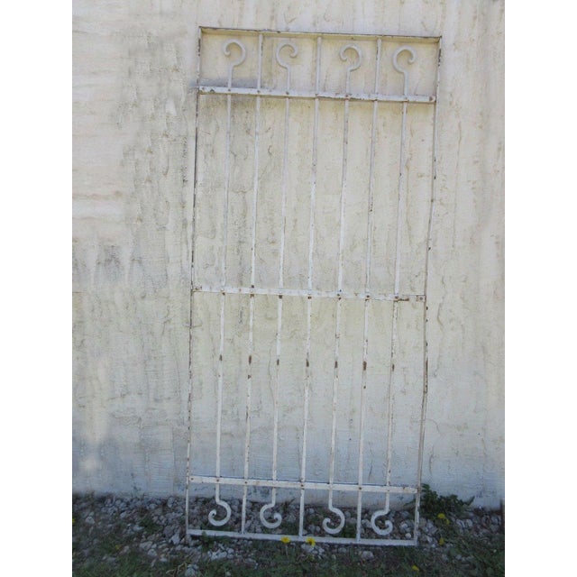 A piece of architectural salvage. Heavy and sturdy. Piece does show signs of age related wear including rust, flaking...