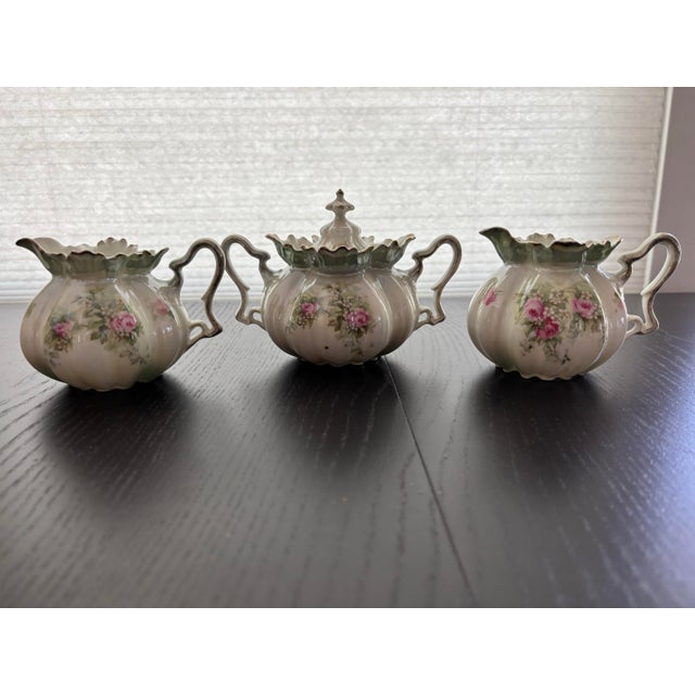 Antique RS Prussia porcelain creamer and lidded sugar bowl set. Authentic "Red Mark" (wreath with a star and "RS Prussia"...