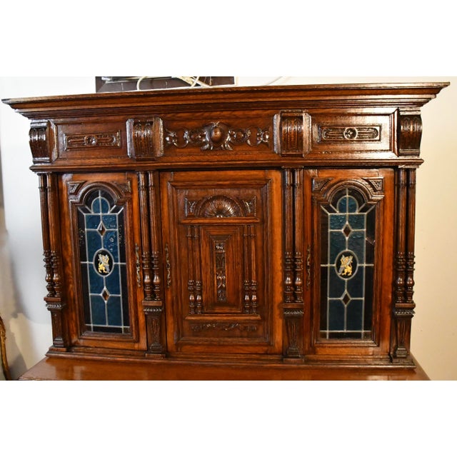 We are pleased to offe this beautiful Antique French Gothic Revival cabinet, from the 1860s. This cabinet is made of solid...