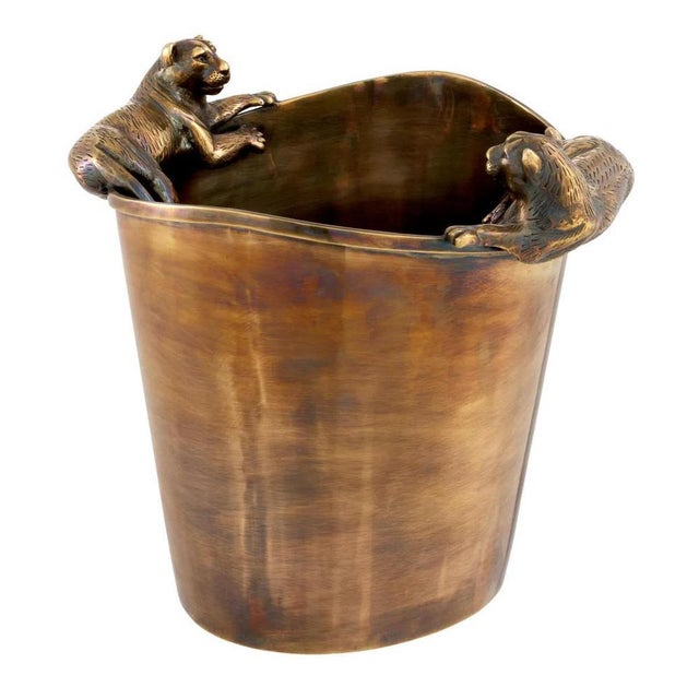 Pair of ice buckets, bronze patinated metal, decorated with puma figures. Keep your wine at the ideal temperature with...
