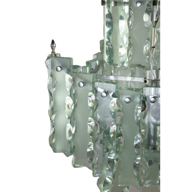 FONTANA ARTE (Attributed) Chandelier with metal structure and blown glass applications. Made in Italy, around 1960....