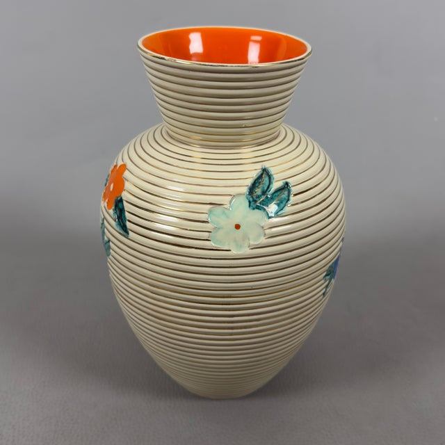 An iconic and rare piece, perfect for true connoisseurs and collectors of 20th-century ceramics. This wide-bellied vase...