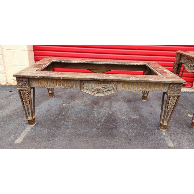 Both pieces are crafted in the neoclassical Louis XVI style, featuring carved giltwood frames and thick, striated marble...