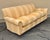 George Smith Full Scroll Arm Sofa with straight top and down filled seat cushions on turned mahogany legs with brass casters.