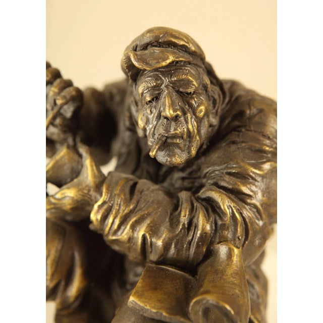 Early 21st Century Atlie Bronze Figure of an Older Man Crouching, Reading, Striking Match (A) For Sale - Image 5 of 13