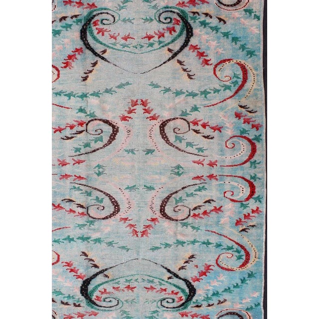 Vintage Art Nouveau design Turkish Rug in Blue. Measures: 6'3 x 9'1. Vintage Art Nouveau design Rug in Shades of Blue with...