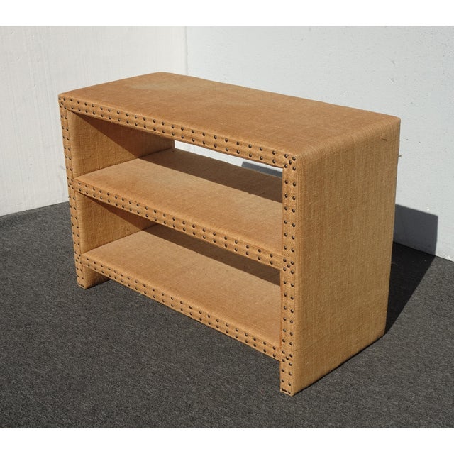 Unique Bookcase in Good Vintage Condition. Solid and Firm. The shelves have a few areasthat are faded. Otherwise, Wear is...