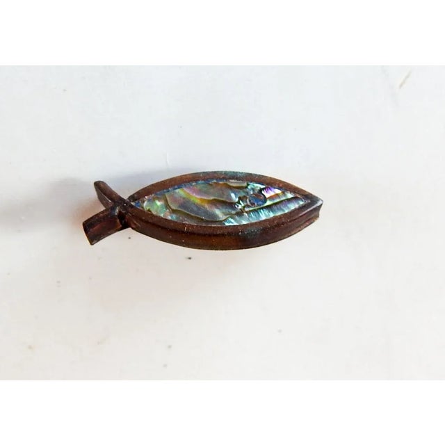 Set of 3 vintage fish shape copper and abalone shell buttons. 7/8" dia. x 3/8" . They look to be hand made, but no...