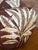 A fabulous monumental porcelain ginger jar by Oriental Accent featuring an all-over tropical banana leaf motif against a...