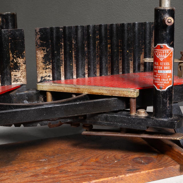 ABOUT Antique miter box model 1306C mounted on a wooden base. Designed for making precise angled cuts in woodworking with...