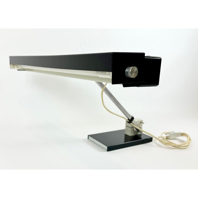 The lamp is adjustable at the top and bottom of the arm. The dimensions given are approximate maximum dimensions, but may...