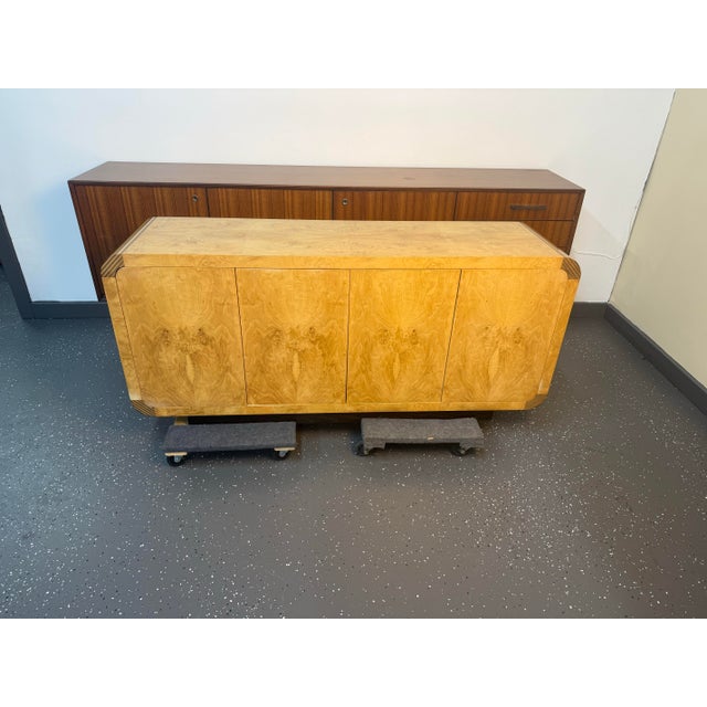 This is a Milo Baughman style burl wood credenza from the Scene Two Collection by Henredon. Features a book-matched olive...