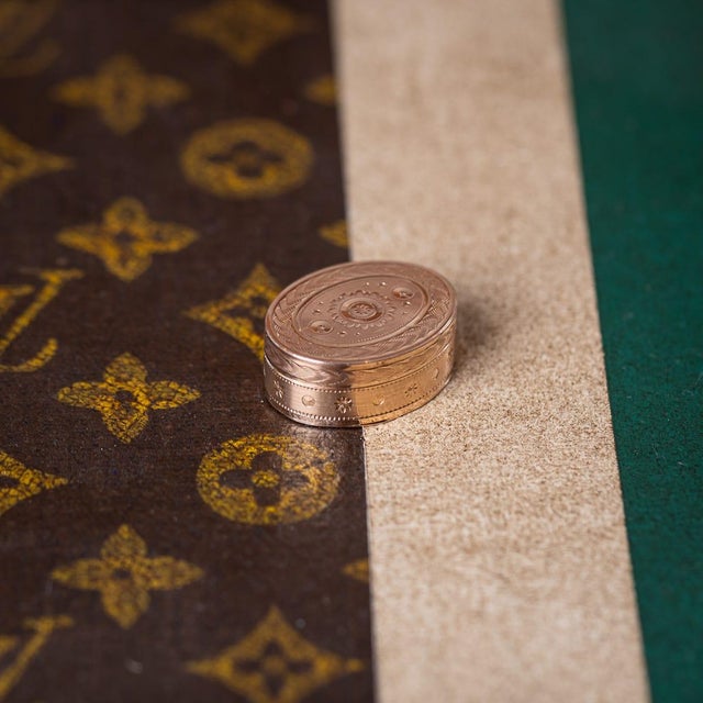 Antique early 19th century Georgian 18K solid gold vinaigrette, oval in form, the lid and base adorned with floral and...