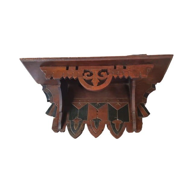 Antique Eastlake wall shelf measures 20" wide by 7 " deep by 8.5 " high. Great rustic charm.