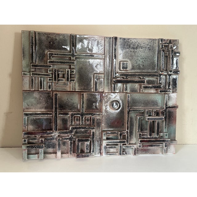 An exceptional piece by the artist Jean Pierre Devaud exhibited at the Lausanne Museum, it is an assembly of 4 ceramic...