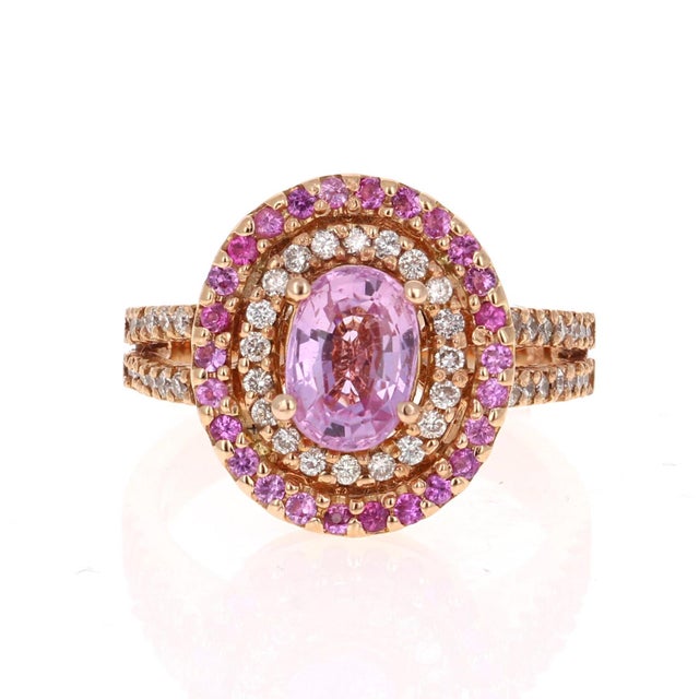 Breathtaking Pink Sapphire Diamond Ring with a beautiful split shank setting! Can be the most unique Engagement or...