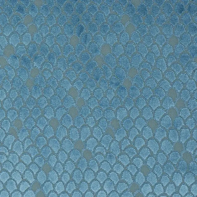 Named after Esther Williams, this elegant fish scale design makes a subtle splash. Tonal variations and shimmery filament...