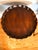 A vintage Chippendale style mahogany pie-crust side tea table on a tripod pedestal base with a round scalloped top, raised...