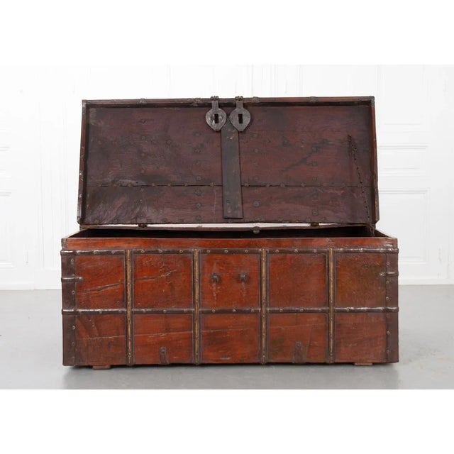 Dating to the 19th century when India was still an English colony, this Anglo-Indian style teak trunk retains original...