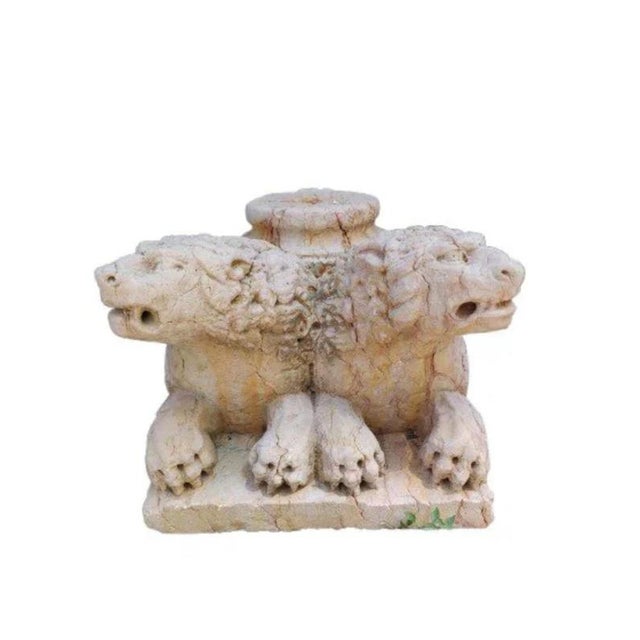 Spectacular marble base depicting a pair of lions with joined bodies 18th century it likely served as the base for a holy...