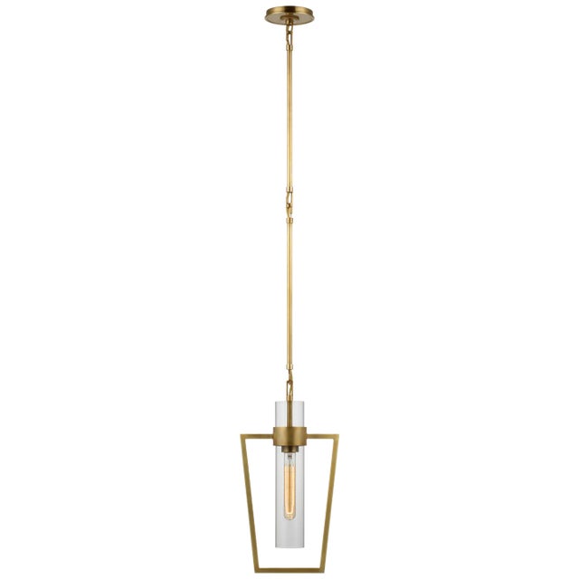 Presidio Petite Caged Pendant in Hand-Rubbed Antique Brass with Clear Glass Designer: Ian K. Fowler Fixture Height: 18"...
