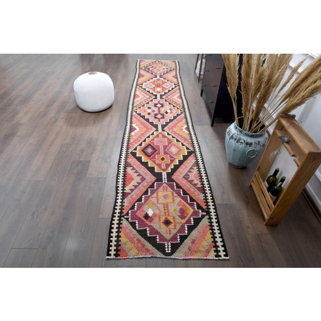Vintage Turkish Hand-Knotted Runner rug is a semi-antique vintage runner rug. The '70s Eastern region of Anatolian's...
