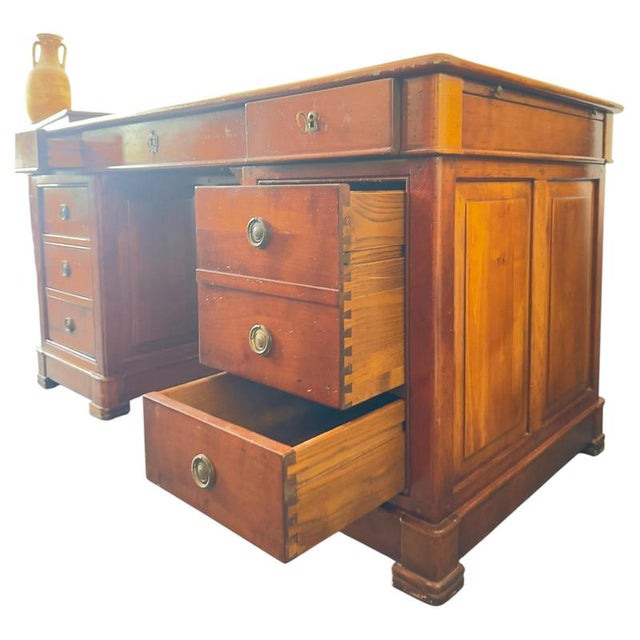 This is an exceptional 19th-century English partners desk, showcasing classic Victorian craftsmanship and a rich, warm...