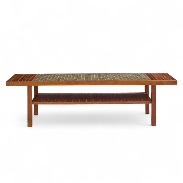 Jane and Gordon Martz for Marshall Studios Walnut and Tile Coffee Table This coffee table measures: 60.5 wide x 19.25 deep...