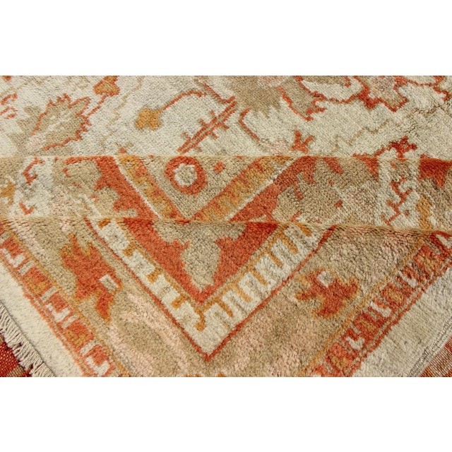 Antique Turkish Floral Oushak Rug in Cream, Rust Red, Orange and Green For Sale - Image 11 of 12