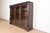 A gorgeous antique American Empire or late Victorian triple bookcase In the manner of R.J. Horner USA, Circa 1900...