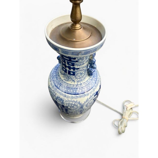 This vintage pair of Blue and White Chinoiserie Lamps exude a coastal regency style perfect for Palm Beach or any seaside...