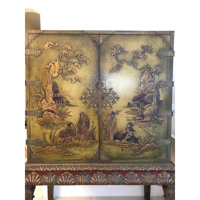 Absolutely stunning, well-preserved 19th century Japanese Chinoiserie Cabinet. Front two panels feature art, originally...