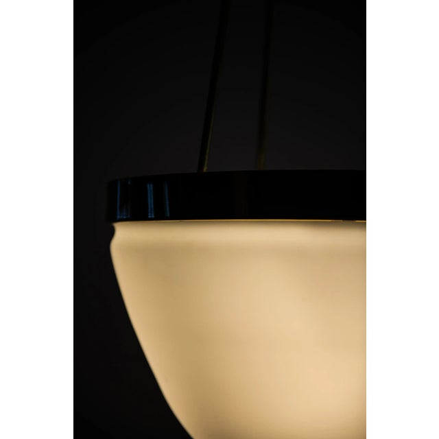 - Rare ceiling lamp model Moon designed by Lars Bylund - Produced by Ateljé Lyktan in Åhus, Sweden - Made of glass and...