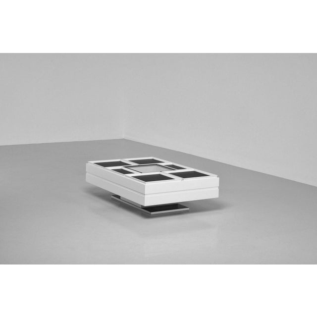 Highly versatile coffee table designed by Carlo Hauner and manufactured by Forma, Italy 1961. This coffee table has a...