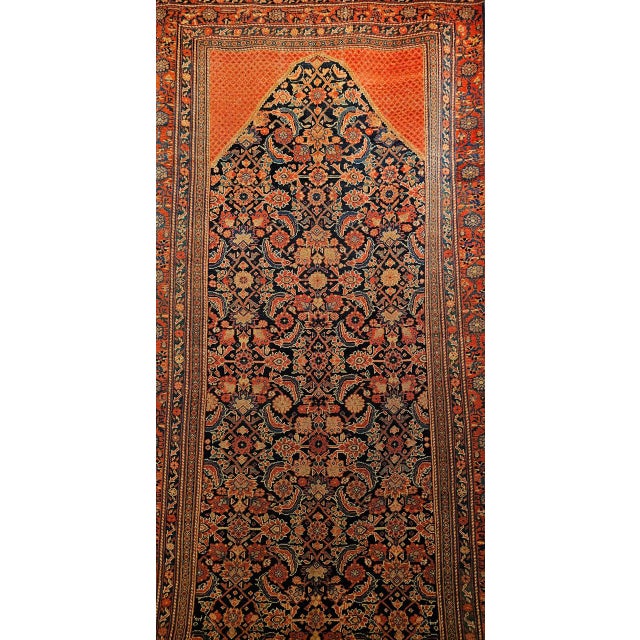 "This vintage Persian Malayer gallery rug from the early 20th century showcases the enduring artistry of Northwest Persian...