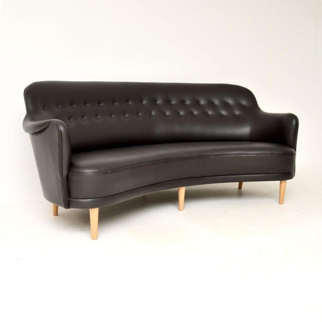 This is an absolutely stunning and iconic design. It’s the Swedish Leather Samsas Round Sofa designed by Carl Malmsten in...