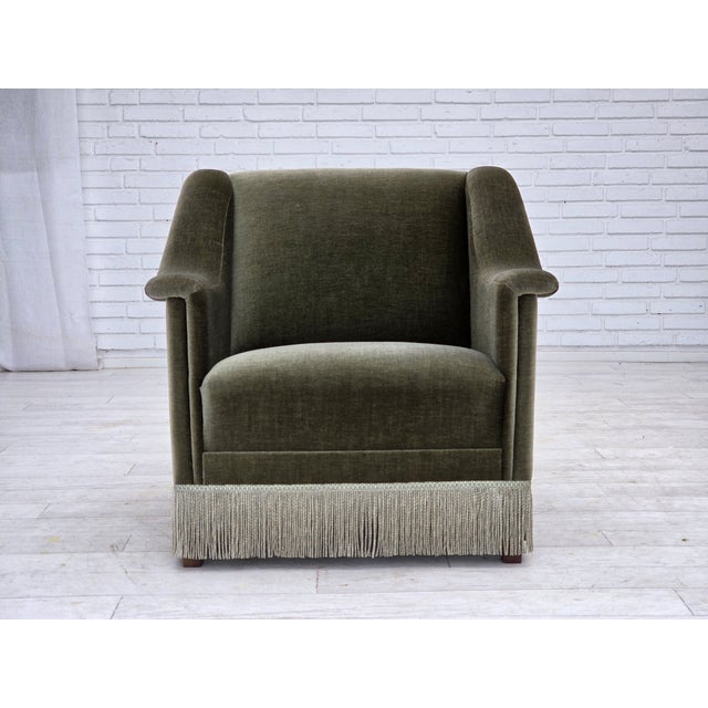 1970s, Danish armchair. Original green furniture velour, beech wood, springs in the seat. Original very good condition: no...