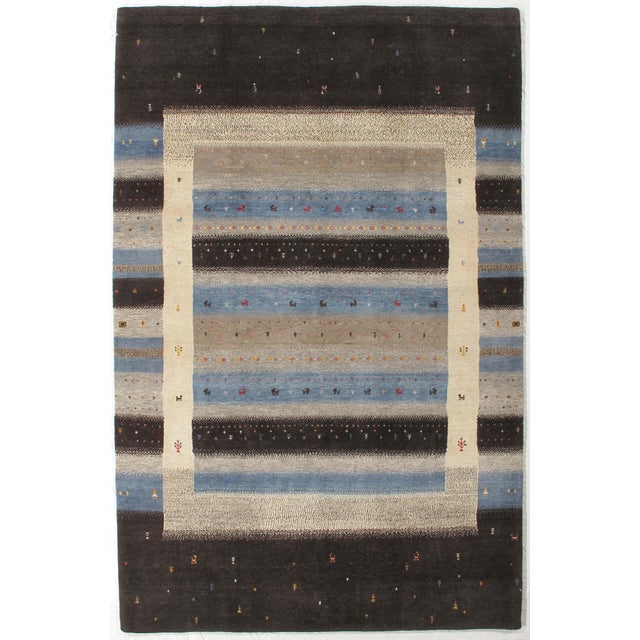 Vintage Hand-knotted Indo Gabbeh rug featuring a structured composition with horizontal bands framed by a contrasting...