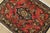 An authentic vintage traditional Qom rug hand-knotted with fine wool and natural dyes. This intricately woven rug features...