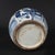 Round lidded Chinese porcelain jar hand‑painted in classic blue‑and‑white. The exterior depicts the traditional "Qilin...