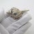 This vintage silver decorative object depicts a sea shell (conchiglia). Handcrafted in florence, tuscany during the 1970s...