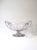 A substantial glass urn with scalloped edge and handles, circa early-20th century USA. An American glass urn with...